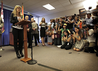 Columbian singer Shakira speaks to the media at Phoenix City Hall Thursday, April 29, 2010. The pop star was visiting Phoenix to voice her oppisition to the new Arizona immigration law. (AP Photo/Matt York)