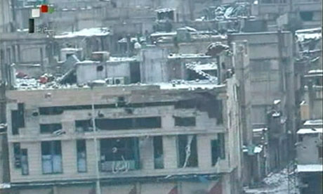 Video footage shown on Syria TV is said to show damaged buildings in Baba Amr